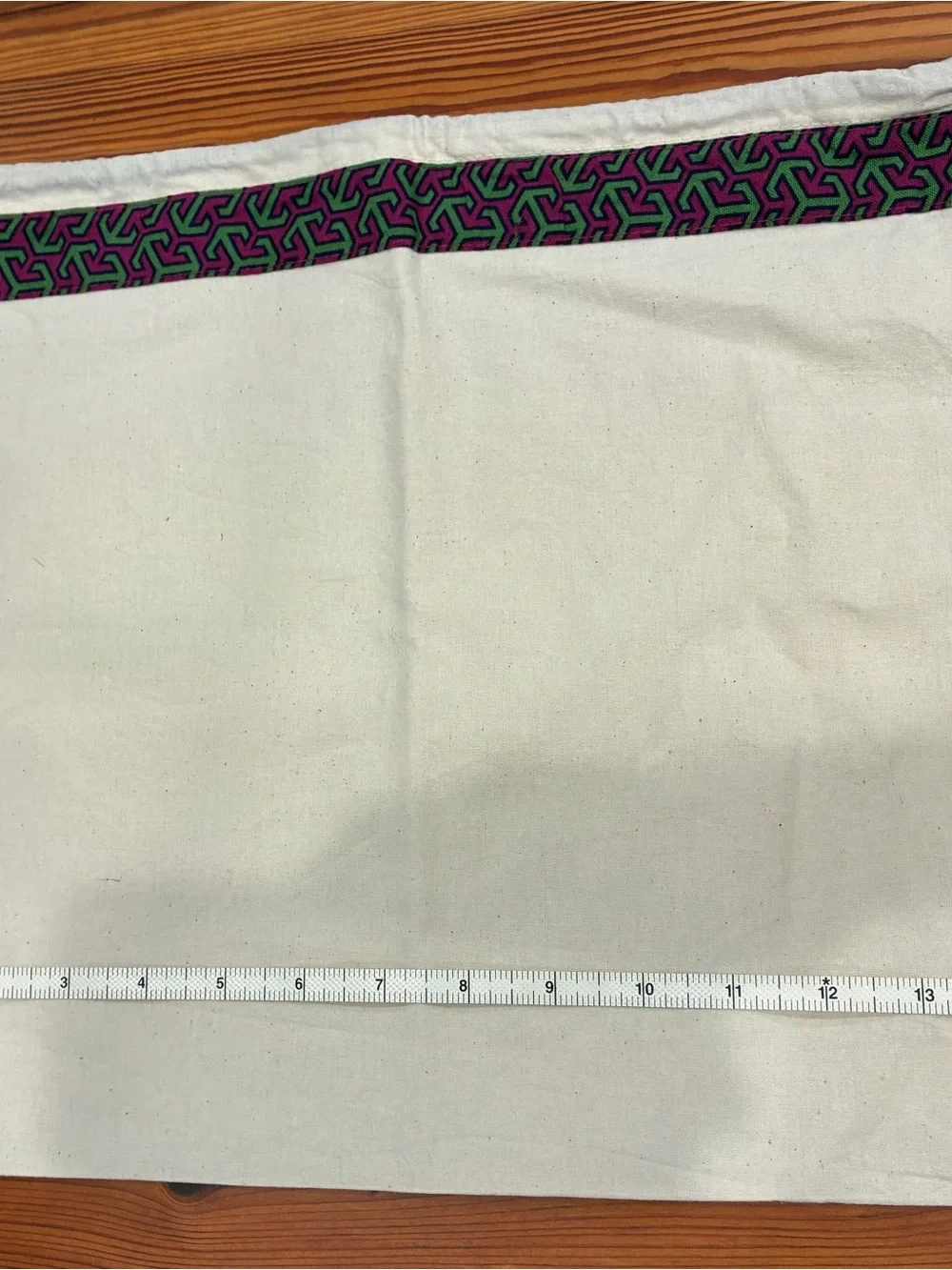 Tory Burch Cream Dust Bag with Purple & Green Trim and Gold Logo Charm